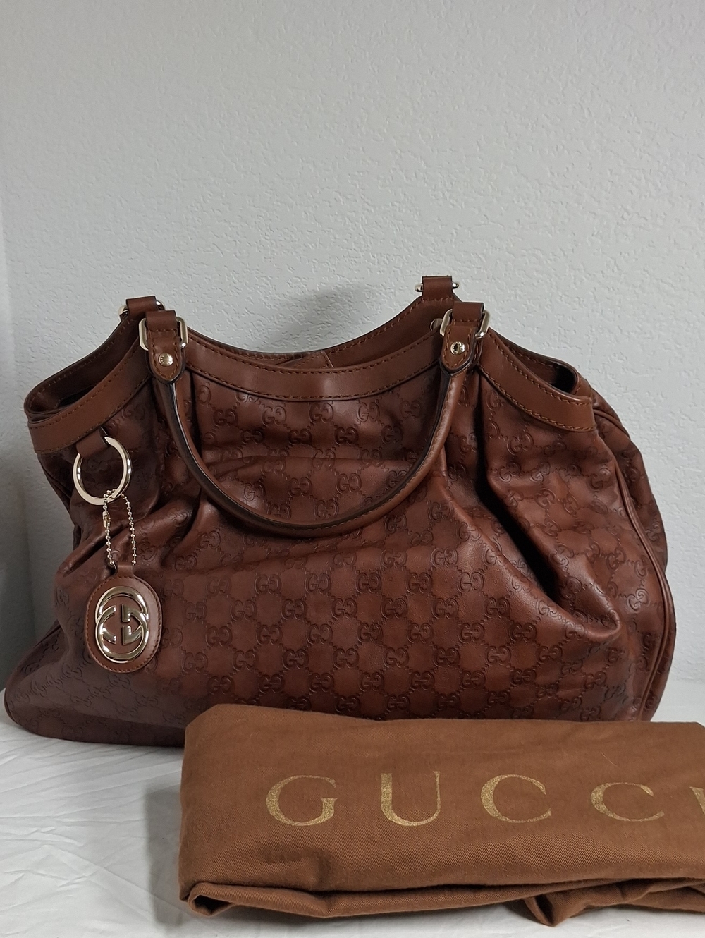 Gucci Brown Embossed Monogram Shoulder Bag with Logo Charm